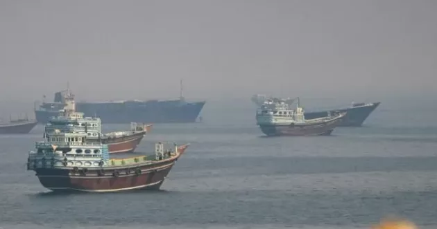 Vessels were visible across the Strait of Hormuz from Oman this week