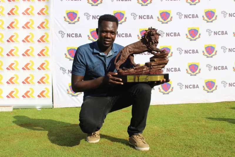Isaac Makokha poses after winning the NCBA Railway Invitational