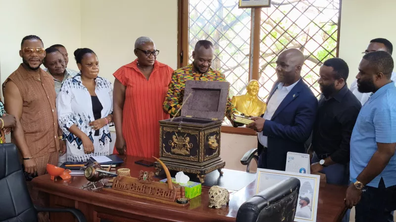 Jomvu DCC Dolphine Okondo [3rd L, front row], MP Badi Twalib and DRC honorary consul in Mombasa Kambale Mukokoma [with golden Ruto bust] in Twalib’s Jomvu office on Monday /  BRIAN OTIENO