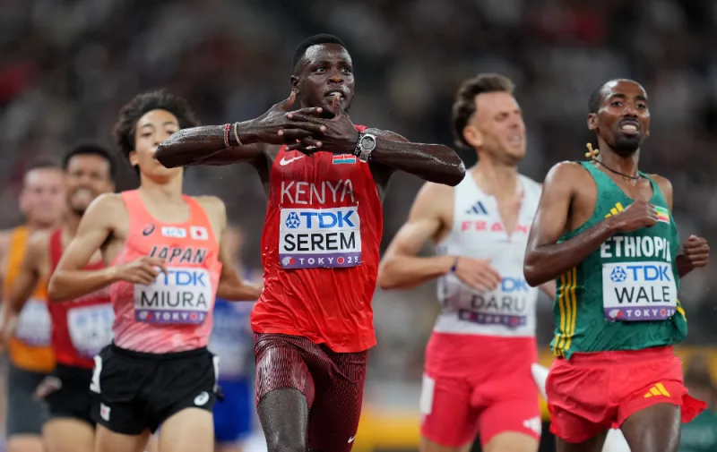 Edmund Serem (front) of Kenya reacts as crossing the finish line during the men's 3000m steeplechase heat at the 2025 World Athletics Championships in Tokyo, Japan/ XINHUA