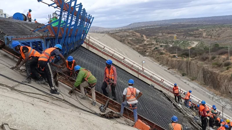 Photo caption: Workers at the Thwake Multi-purpose dam who resumed working on the concrete Phase on Monday.