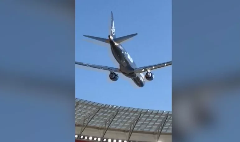 Moment two planes fly less than 50 feet above stadium