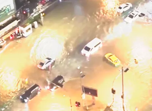 Bangkok roads submerged as flood disaster declared