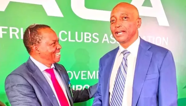 Tusker CEO Charles Gacheru with CAF president Patrice Motsepe/HANDOUT
