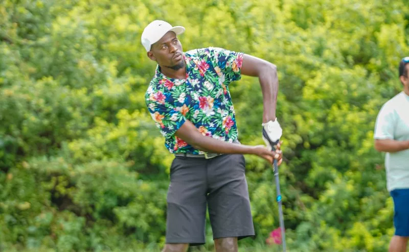 Alex Mwangi follows the path of his tee shot during the NCBA Beach Masters in Diani