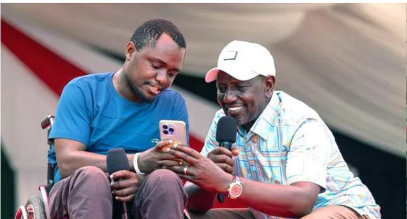 President William Ruto engages a PWD during Nyota fund destribution Right, Abdalla Ndalukari, contractor in Machakos and CEO, Hope Disability Network /PCS/HANDOUT