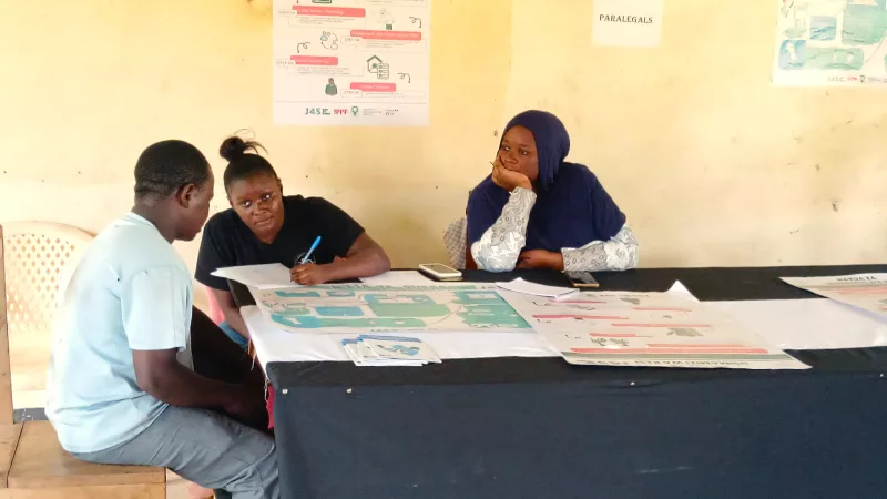 ENYE network members Janice Mbingu and Biasha Jasho offer legal aid services at Jego in Vanga, Kwale County.