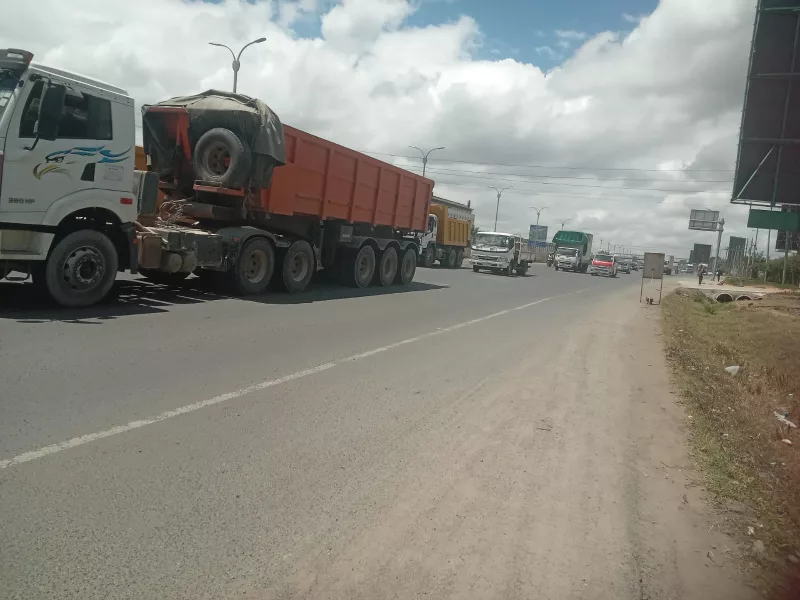 Enforcement officers seen stopping lorries on major highways in Nairobi risking their lives