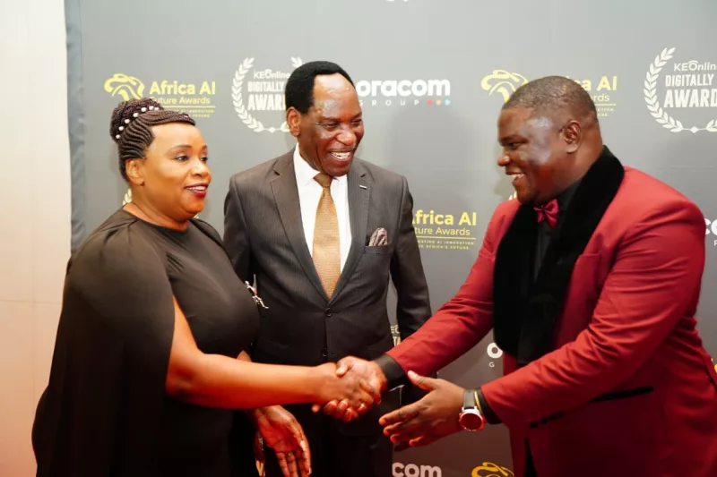 From left Mary N. Karema, OGW, Secretary ICT, Digital Economy &amp; Emerging Technologies, Dr. Ezekiel Mutua, Chair of MCSK Board and Wycklife Ochola, CEO Oya Micro-credit Kenya during the Digitally fit award ceremony where OYa CEO won Digitally Fit Microfinace CEO of the year