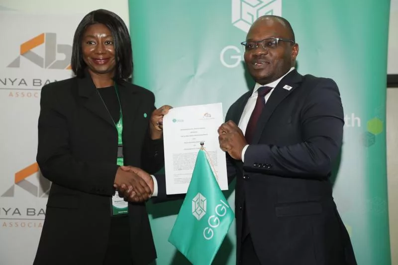 Nagnouma Kone, Manager, Africa Strategy and Partnerships, and Head of Kenya Office, Global Green Growth Institute (GGGI), and Raimond Molenje, Chief Executive Officer, Kenya Bankers Association during the signing ceremony.
