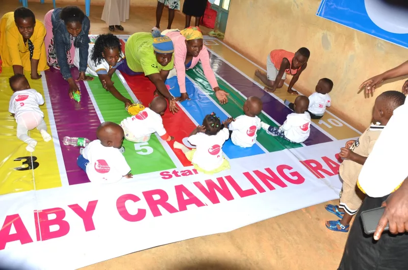 Baby crawling competition by Maisha Mothers - ANN WANGECI