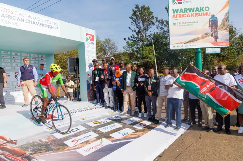 CS Salim Mvurya flags off riders during the CAC road cycling African championships in Kisumu/ HANDOUT