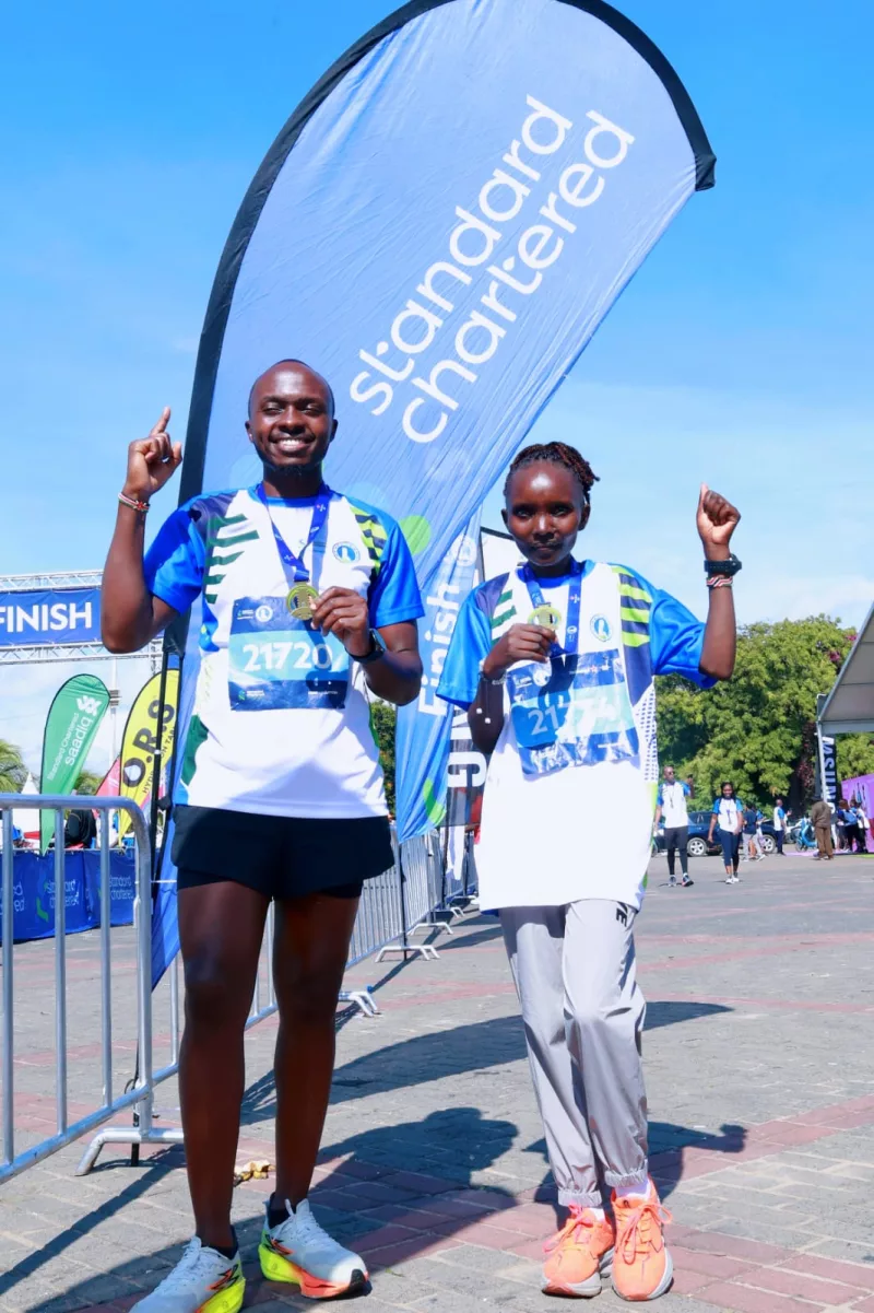Brian Kurgat and Eusilah Jemeli after winning the men’s and women’s 21km races/ HANDOUT