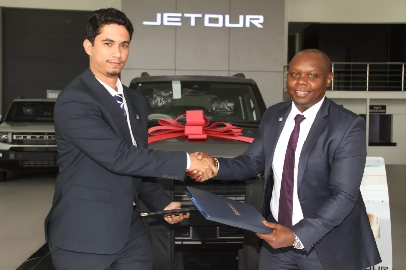 Global Motors Centre Limited director Abdallah Zubedi with Eric Wambua, Director, Corporate and Institutional Banking, SBM Bank Kenya during the signing of MoU with Global Motors Centre on October 26, at the Jetour Showroom in Nairobi/ HANDOUT