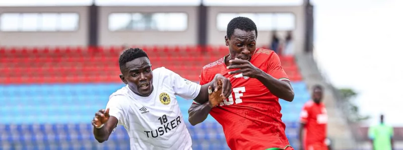 Tusker's Stephen Omondi vies for the ball with Ulinzi stars Billi Okite