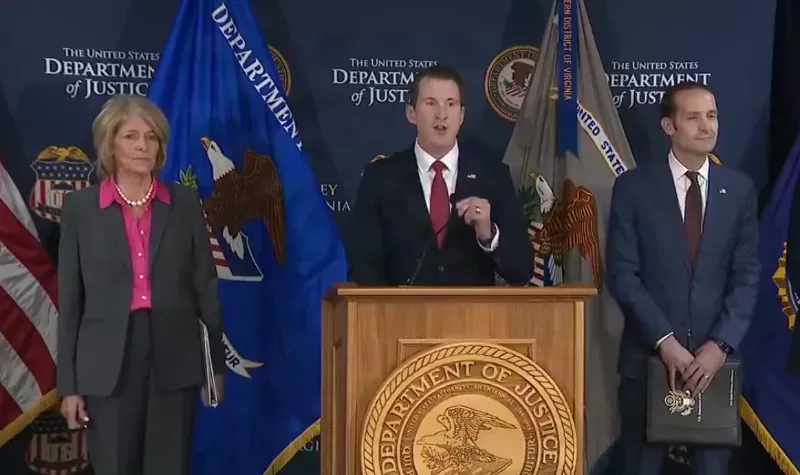 US Assistant Attorney General Colin McDonald during the announcement/SCREENGRAB