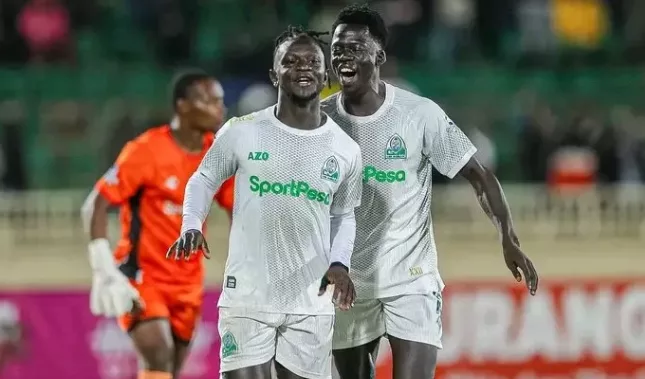 Gor Mahia players Shariff Musa and Jackson Dwang celebrate their goal against Murang'a Seal/HANDOUT