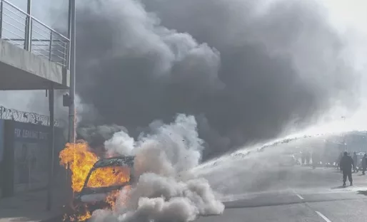 Cars torched and shops looted as anti-migrant violence erupts in SA