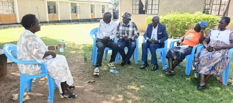 Dr Beldina Otieno listening to stories of raising grandchildren from grandparents of Emukhuwa village in Etenje ward, Mumias West sub-county/IMAGE/HILTON OTENYO