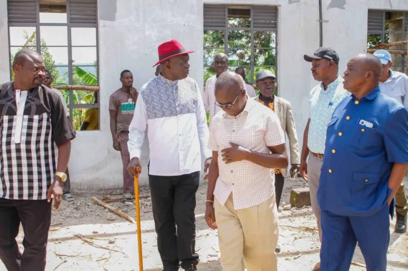 Teso North MP Oku Kaunya ( in a red cap) and other planning committee members  inspecting the ongoing works at Kakapel Cultural Centre and Achunet Stadium in Malaba ahead of the historic celebrations marking the fourth coronation anniversary of His Majesty Emormor Papa Sande Emolot, the Iteso Cultural Leader, scheduled for 31st October 2026/IMAGE/HILTON OTENYO