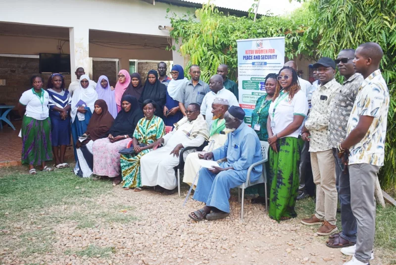 Participants of the Madogo peace-dialogue forum in Tana River county on Friday pose for a group photograph/Musembi Nzengu.