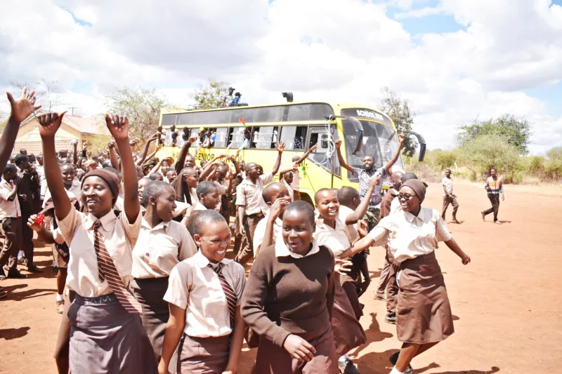 Students as Kaundu Senior School celebrating the school bus donation from the Mwingi North Ng-CDF kitty on Saturday.