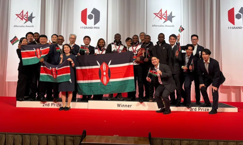 The Isuzu East Africa technical and aftersales team celebrates at the I-1 Grand Prix alongside Isao Wada, executive deputy managing director &amp; board member, and Julius Mwangi, director, aftersales, leasing &amp; channel development and other delegates/ HANDOUT