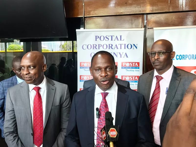 Communications Authority director-general David Mugonyi, public investments &amp; assets management principal secretary Cyrell Odede and post master general John Tonui during a briefing in Nairobi