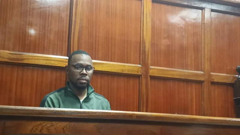 Abdillah Abbas Hamidou, a Comoran national accused of extorting a woman and threatening to kill her, at the Milimani Magistratés Court on Thursday /HANDOUT