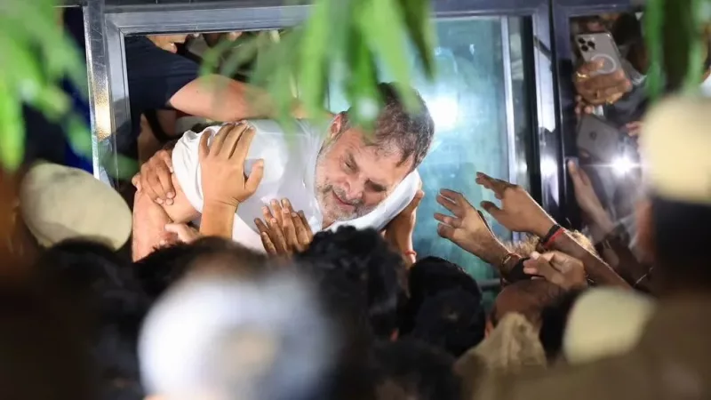 India's opposition leader dragged onto bus as police break up protest