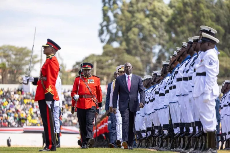 President William Ruto inspects a parade during the Mashujaa Day celebration at Kipchoge Keino Stadium in Eldoret.