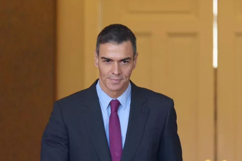 This file photo taken on Nov. 27, 2025 shows Spanish Prime Minister Pedro Sanchez walking out of La Moncloa Palace in Madrid, Spain. (Xinhua/Meng Dingbo)