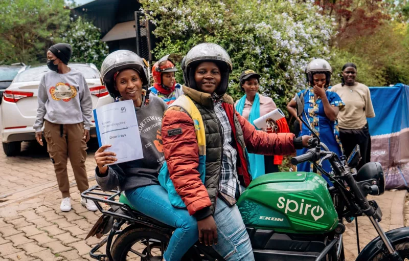 A rider and other participants during the Spiro and Entrepreneurial Solutions Partners (ESP launch of the Women in E-Mobility programme in Rwanda/ HANDOUT