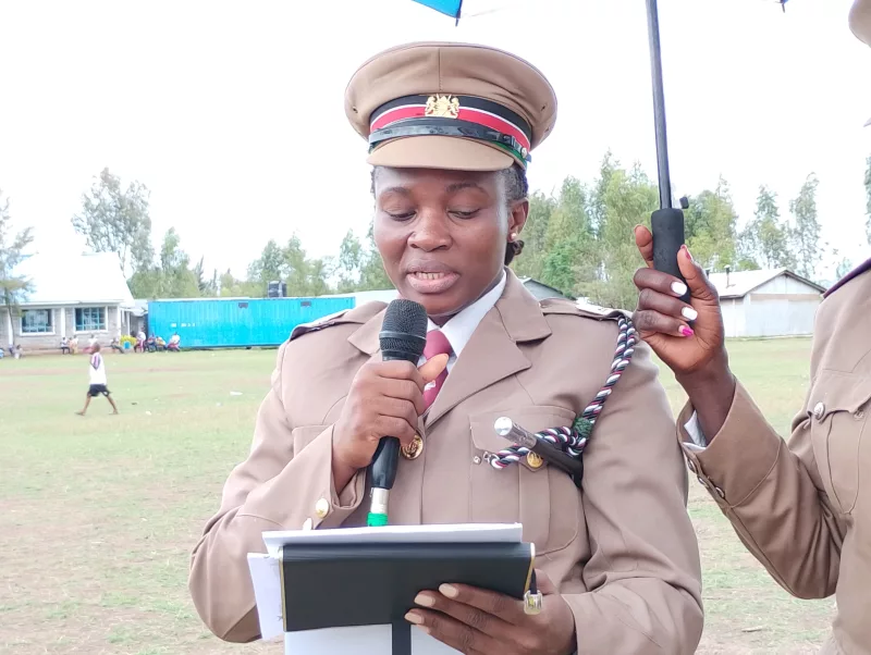 Kadibo Assistant County Commissioner Casline Omollo speaking during Mashujaa Day celebrations at Ugwe Primary School in Bwanda Location,