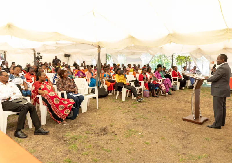 Bonface Kinoti, Director of Advocacy at Equity Group Foundation, speaks during the launch of HER Financial Freedom in Isinya, Kajiado County.