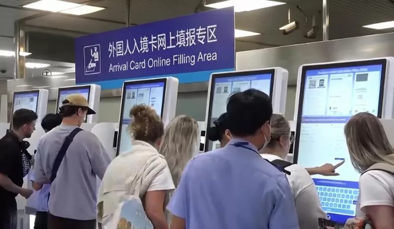 Foreign tourists fill out their arrival cards online at Arrival Card Online Filling Area